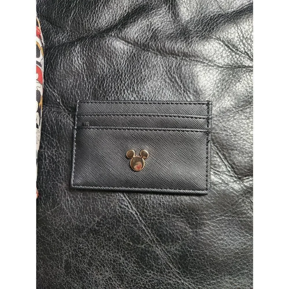 Disney Mickey Mouse backpack and matching card holder. Exterior zippered pocket